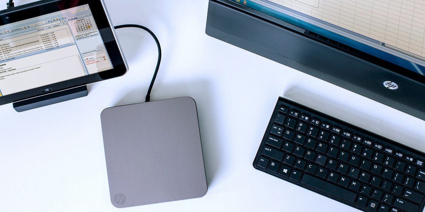How to Use CDs and DVDs Without a Disk Drive (Complete Guide 2026)