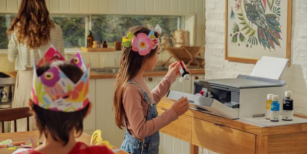 Girl next to a HP printer